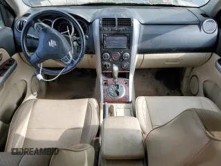 2013 Suzuki Grand Vitara Limited z VIN JS3TD0D79D4100171, wystawiony jako Copart lot #61174905 z przebiegiem 119 394 mil mil oraz Czysty tytuł • Clean title. Historia ofert i sprzedaży dostępna na DreamBid. Obrazek 8.