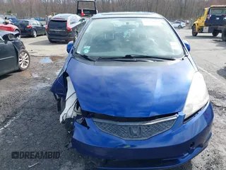 2009 Honda Fit Sport with VIN JHMGE88459S053654, listed as a IAAI auction lot 42036062 with 190,246 mi miles. Bid and sale history available at carsss.com. Image 6.