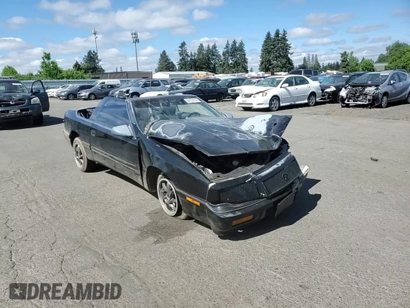 1992 Chrysler LeBaron z VIN 1C3XU4537NF129794, wystawiony jako Copart lot #71594804 z przebiegiem 156 624 mil mil oraz Szkody całkowita. Historia ofert i sprzedaży dostępna na DreamBid. Obrazek 10.