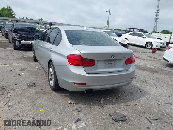 2012 BMW 3 Series 328i with VIN WBA3A5C50CF349365, listed as a IAAI auction lot 42379944 with 193,548 mi miles and . Bid and sale history available at DreamBid. Image 3.