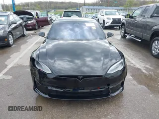 2022 Tesla Model S Plaid with VIN 5YJSA1E60NF460244, listed as a IAAI auction lot 41996403 with Not provided miles and . Bid and sale history available at DreamBid. Image 12.