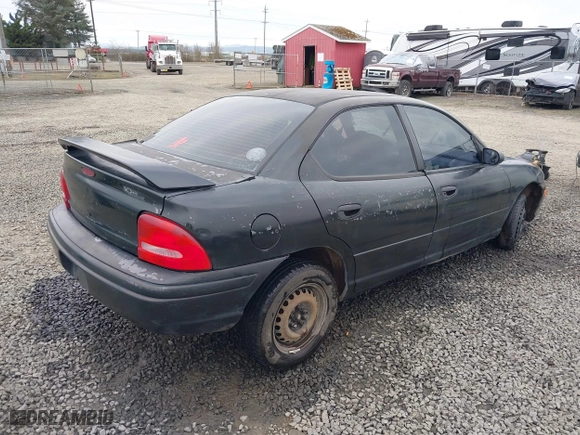 1999 Dodge Neon Competition with VIN 1B3ES47C9XD111397, listed as a IAAI auction lot 41702657 with 210,033 mi miles. Bid and sale history available at carsss.com. Image 4.