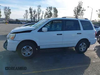 2005 Honda Pilot EX with VIN 5FNYF18475B060655, listed as a IAAI auction lot 41381619 with 142,680 mi miles and . Bid and sale history available at DreamBid. Image 14.