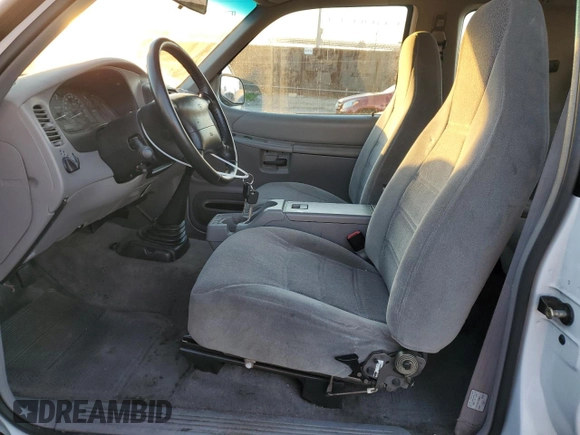 1999 Ford Explorer Sport с VIN 1FMYU22X1XUA31138, выставлен на аукционе Copart как лот 87529095 с пробегом 60 805 миль миль и Чистый • Clean title. История ставок и продаж доступна на DreamBid. Изображение 7.