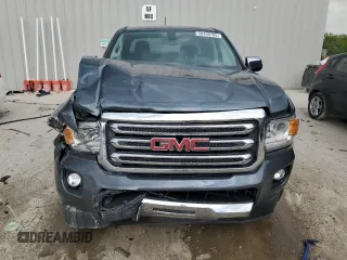 2015 GMC Canyon 4WD SLT z VIN 1GTG6CE38F1136669, wystawiony jako Copart lot #58400785 z przebiegiem 114 685 mil mil oraz Nie do naprawy • Non repairable. Historia ofert i sprzedaży dostępna na DreamBid. Obrazek 5.