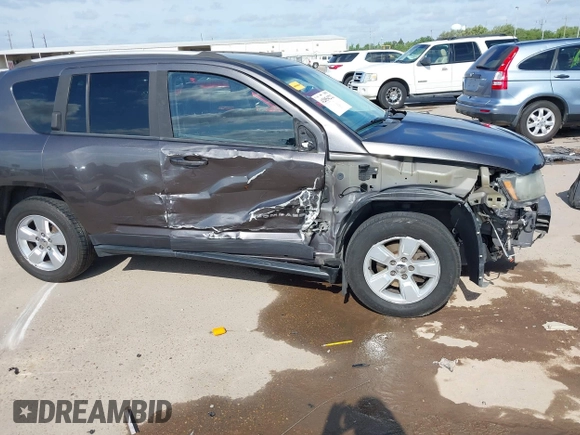 2016 Jeep Compass Latitude z VIN 1C4NJCEA2GD665636, wystawiony jako IAAI lot #42054222 z przebiegiem 155 071 mil mil oraz . Historia ofert i sprzedaży dostępna na DreamBid. Obrazek 19.