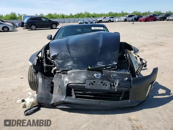 2013 Nissan 370Z Touring z VIN JN1AZ4EH4DM881576, wystawiony jako Copart lot #50645635 z przebiegiem 123 515 mil mil oraz Szkoda całkowita • Salvage title. Historia ofert i sprzedaży dostępna na DreamBid. Obrazek 11.
