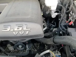 2020 Ram 1500 Tradesman z VIN 1C6RR6FG7LS146206, wystawiony jako Copart lot #67521315 z przebiegiem 104 804 mil mil oraz Szkoda całkowita • Salvage title. Historia ofert i sprzedaży dostępna na DreamBid. Obrazek 13.