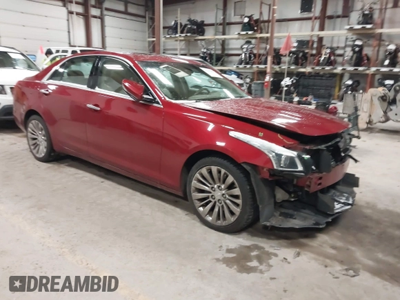 2016 Cadillac CTS Luxury Collection AWD z VIN 1G6AX5SX6G0124584, wystawiony jako IAAI lot #41235515 z przebiegiem 82 286 mil mil oraz . Historia ofert i sprzedaży dostępna na DreamBid. Obrazek 1.