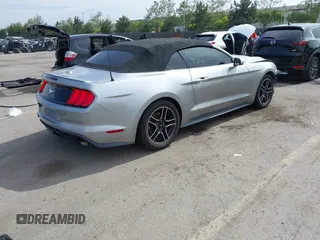 2020 Ford Mustang EcoBoost z VIN 1FATP8UH6L5131602, wystawiony jako IAAI lot #42228919 z przebiegiem 82 807 mil mil oraz . Historia ofert i sprzedaży dostępna na DreamBid. Obrazek 4.