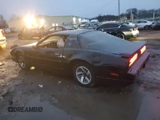 1990 Pontiac Firebird with VIN 1G2FS23TXLL205077, listed as a Copart auction lot 44035705 with 142,809 mi miles and Salvage title. Bid and sale history available at DreamBid. Image 2.