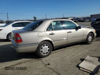 1996 Mercedes-Benz C with VIN WDBHA28E7TF319617, listed as a Copart auction lot 80874744 with 92,068 mi miles and Salvage Title. Bid and sale history available at carsss.com. Image 3.
