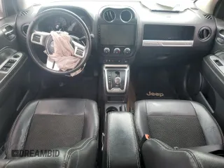 2016 Jeep Compass Latitude with VIN 1C4NJCEA4GD614932, listed as a Copart auction lot 60508845 with 144,833 mi miles and Salvage title. Bid and sale history available at DreamBid. Image 8.
