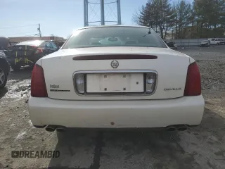 2001 Cadillac DeVille z VIN 1G6KD54YX1U252491, wystawiony jako Copart lot #50325445 z przebiegiem Nie podano mil oraz Szkoda całkowita • Salvage title. Historia ofert i sprzedaży dostępna na DreamBid. Obrazek 6.
