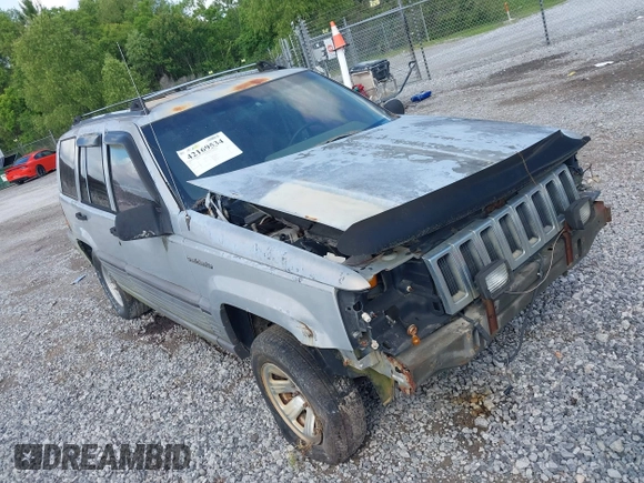 1995 Jeep Grand Cherokee Laredo with VIN 1J4GZ58S6SC756256, listed as a IAAI auction lot 42169534 with 255,516 mi miles. Bid and sale history available at carsss.com. Image 1.