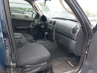 2002 Jeep Liberty Sport with VIN 1J4GL48K42W260513, listed as a IAAI auction lot 42163192 with 146,789 mi miles. Bid and sale history available at carsss.com. Image 5.