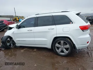 2014 Jeep Grand Cherokee Overland with VIN 1C4RJFCG9EC162098, listed as a IAAI auction lot 41746022 with 120,588 mi miles and . Bid and sale history available at DreamBid. Image 13.