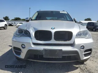 2012 BMW X5 35i with VIN 5UXZV4C5XCL751020, listed as a Copart auction lot 59327845 with 106,249 mi miles and Salvage title. Bid and sale history available at DreamBid. Image 5.