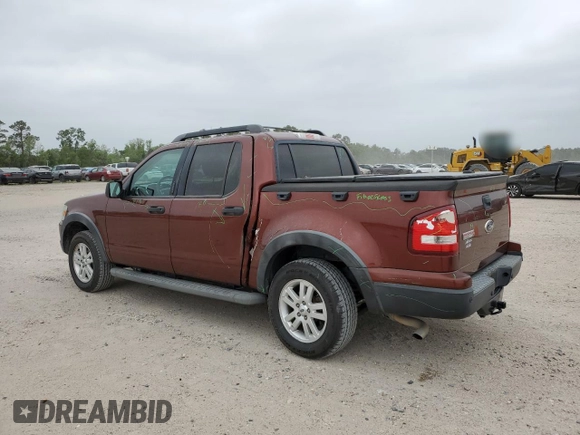 2010 Ford Explorer Sport Trac XLT z VIN 1FMEU3BE2AUF07380, wystawiony jako Copart lot #52099905 z przebiegiem 149 856 mil mil oraz Szkody całkowita. Historia ofert i sprzedaży dostępna na DreamBid. Obrazek 2.