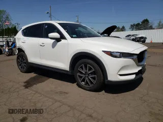 2018 Mazda CX-5 Touring with VIN JM3KFBCMXJ0389773, listed as a Copart auction lot 54737795 with 82,103 mi miles and Salvage Title. Bid and sale history available at DreamBid. Image 4.