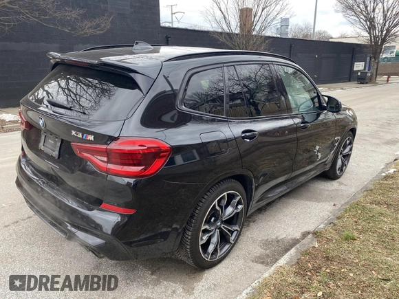 2021 BMW X3 M z VIN 5YMTS0C05M9G46973, wystawiony jako IAAI lot #41334083 z przebiegiem 42 819 mil mil oraz . Historia ofert i sprzedaży dostępna na DreamBid. Obrazek 4.