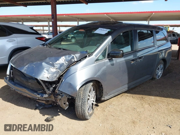 2012 Honda Odyssey EX-L with VIN 5FNRL5H6XCB103498, listed as a IAAI auction lot 42065658 with 104,933 mi miles and . Bid and sale history available at carsss.com. Image 17.