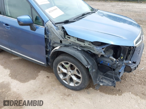 2016 Subaru Forester Touring z VIN JF2SJAVC7GH430720, wystawiony jako IAAI lot #42263999 z przebiegiem 132 853 mil mil oraz . Historia ofert i sprzedaży dostępna na DreamBid. Obrazek 17.