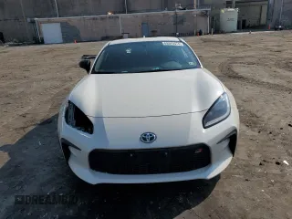 2023 Toyota GR86 with VIN JF1ZNBC11P8757595, listed as a Copart auction lot 69376574 with 34,450 mi miles and Salvage Title. Bid and sale history available at carsss.com. Image 5.