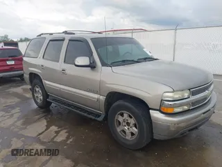 2001 Chevrolet Tahoe LS z VIN 1GNEC13T81J178816, wystawiony jako IAAI lot #42159448 z przebiegiem 163 379 mil mil oraz . Historia ofert i sprzedaży dostępna na DreamBid. Obrazek 1.