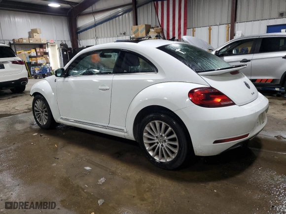 2019 Volkswagen Beetle S with VIN 3VWFD7AT4KM703324, listed as a Copart auction lot 77000024 with 93,346 mi miles and Salvage Title. Bid and sale history available at carsss.com. Image 2.