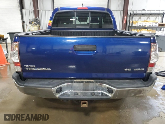 2015 Toyota Tacoma with VIN 3TMLU4EN6FM186016, listed as a Copart auction lot 58404675 with 127,536 mi miles and Salvage title. Bid and sale history available at DreamBid. Image 6.