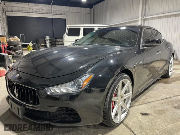 2014 Maserati Ghibli S Q4 z VIN ZAM57RTA9E1112724, wystawiony jako Copart lot #48448635 z przebiegiem 45 525 mil mil oraz Szkoda całkowita • Salvage title. Historia ofert i sprzedaży dostępna na DreamBid. Obrazek 2.