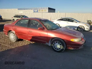 1999 Buick Regal LS with VIN 2G4WB52K0X1553709, listed as a Copart auction lot 75489254 with 243,467 mi miles and Salvage Title. Bid and sale history available at carsss.com. Image 4.