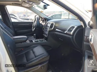 2012 Jeep Grand Cherokee Laredo with VIN 1C4RJFAG6CC279427, listed as a IAAI auction lot 41956034 with 86,689 mi miles. Bid and sale history available at carsss.com. Image 5.