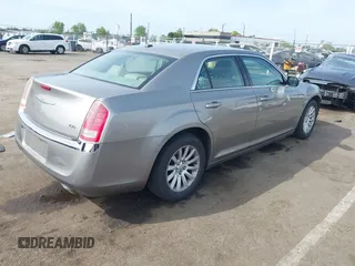2014 Chrysler 300 with VIN 2C3CCAAG3EH322855, listed as a IAAI auction lot 42053129 with 172,687 mi miles. Bid and sale history available at carsss.com. Image 4.