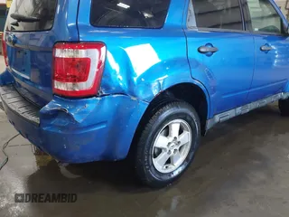 2012 Ford Escape XLS z VIN 1FMCU0C7XCKB44251, wystawiony jako IAAI lot #42151121 z przebiegiem 180 851 mil mil oraz . Historia ofert i sprzedaży dostępna na DreamBid. Obrazek 14.