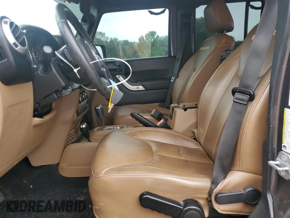 2014 Jeep Wrangler Unlimited Sahara with VIN 1C4HJWEG7EL299548, listed as a Copart auction lot 58522355 with 76,057 mi miles and Clean title. Bid and sale history available at DreamBid. Image 7.