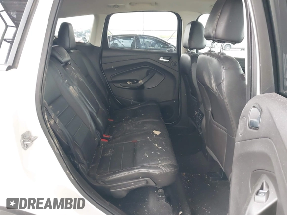2015 Ford Escape Titanium z VIN 1FMCU0J91FUA27610, wystawiony jako IAAI lot #42095995 z przebiegiem 122 521 mil mil oraz . Historia ofert i sprzedaży dostępna na DreamBid. Obrazek 8.