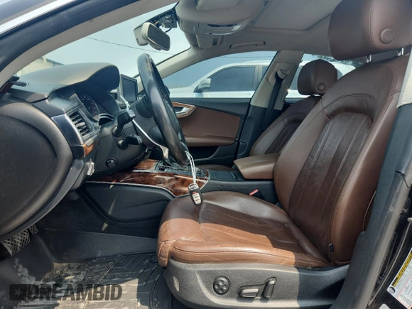 2012 Audi A7 Prestige with VIN WAU2GAFC1CN081915, listed as a Copart auction lot 59494105 with 169,556 mi miles and Salvage title. Bid and sale history available at DreamBid. Image 7.