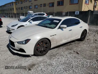 2015 Maserati Ghibli S Q4 z VIN ZAM57RTA5F1147830, wystawiony jako Copart lot #57204205 z przebiegiem 89 828 mil mil oraz Tytuł czysty. Historia ofert i sprzedaży dostępna na DreamBid. Obrazek 1.