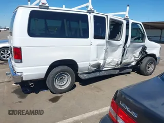 2014 Ford Econoline Passenger XL with VIN 1FBNE3BL7EDA37146, listed as a IAAI auction lot 41871526 with 139,387 mi miles. Bid and sale history available at carsss.com. Image 4.