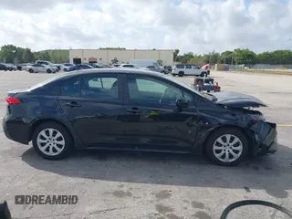 2022 Toyota Corolla LE with VIN 5YFEPMAE6NP348613, listed as a IAAI auction lot 41709618 with 64,406 mi miles and . Bid and sale history available at DreamBid. Image 13.