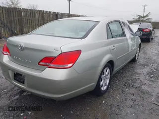 2007 Toyota Avalon XL with VIN 4T1BK36B27U236094, listed as a IAAI auction lot 42025285 with 208,741 mi miles and . Bid and sale history available at carsss.com. Image 4.