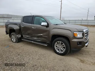 2015 GMC Canyon 4WD SLT with VIN 1GTG6CE38F1197665, listed as a Copart auction lot 51290925 with 22,223 mi miles and Salvage Title. Bid and sale history available at carsss.com. Image 4.