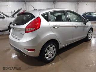 2011 Ford Fiesta SE with VIN 3FADP4EJ8BM138140, listed as a IAAI auction lot 41858510 with 38,475 mi miles. Bid and sale history available at carsss.com. Image 4.