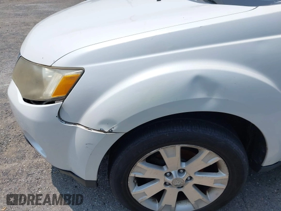 2007 Mitsubishi Outlander LS z VIN JA4MT31X67Z019805, wystawiony jako IAAI lot #42424258 z przebiegiem Nie podano mil oraz . Historia ofert i sprzedaży dostępna na DreamBid. Obrazek 6.
