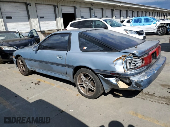 1989 Toyota Supra z VIN JT2MA70J8K0120446, wystawiony jako Copart lot #75893804 z przebiegiem 283 887 mil mil oraz Szkoda całkowita • Salvage title. Historia ofert i sprzedaży dostępna na DreamBid. Obrazek 2.