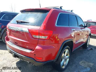 2011 Jeep Grand Cherokee Overland with VIN 1J4RR6GT7BC551649, listed as a IAAI auction lot 41897267 with 82,034 mi miles. Bid and sale history available at carsss.com. Image 4.