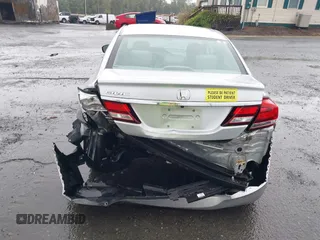 2014 Honda Civic LX z VIN 19XFB2F59EE066922, wystawiony jako IAAI lot #42268141 z przebiegiem 86 015 mil mil oraz . Historia ofert i sprzedaży dostępna na DreamBid. Obrazek 17.