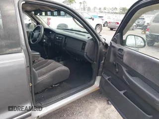2003 Dodge Dakota SLT with VIN 1D7HL42N63S100130, listed as a IAAI auction lot 41419945 with 185,326 mi miles. Bid and sale history available at carsss.com. Image 5.